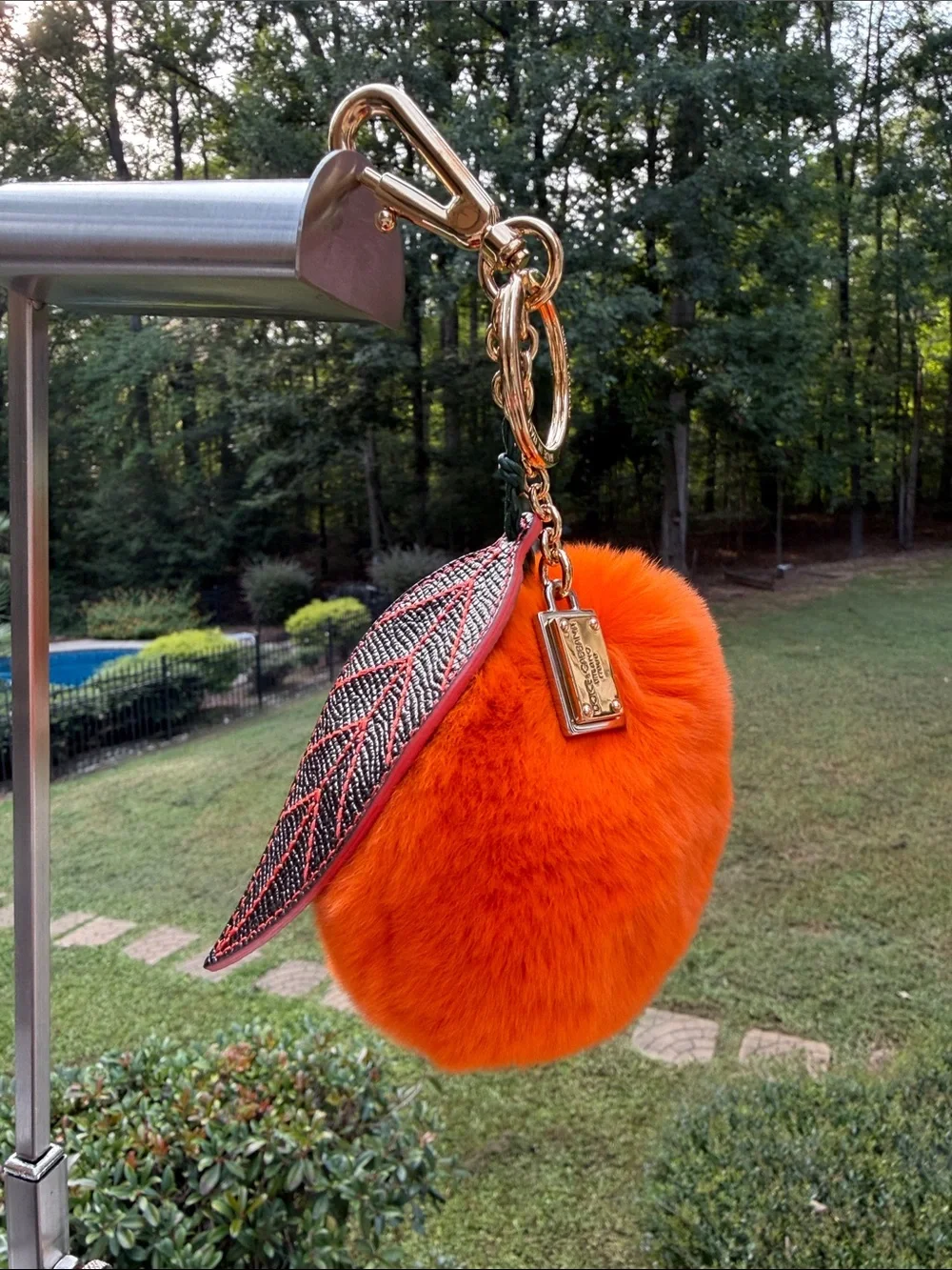 Dolce & Gabbana Orange  Mink Fur Pom-Pom Keychain with Black Leaf Accent